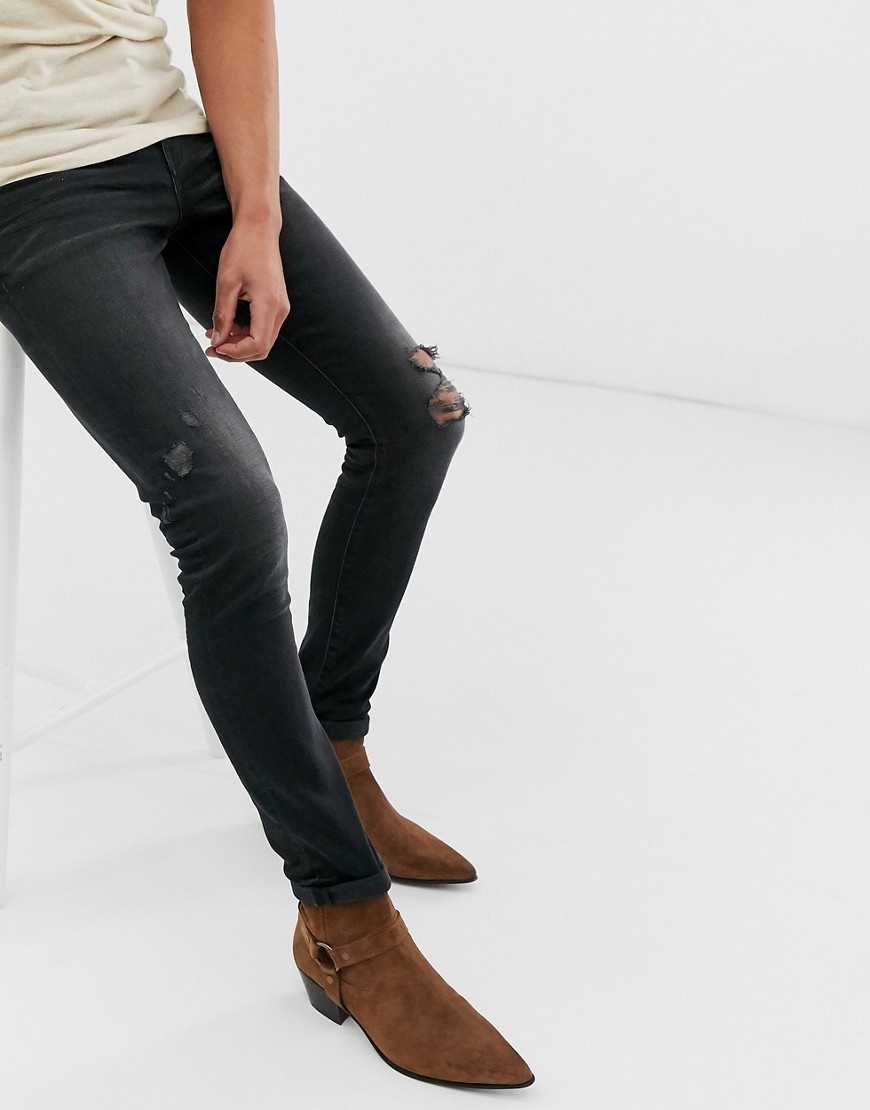 ASOS DESIGN - 12.5oz Superskinny jeans in zwart met wassing met slijtplekken