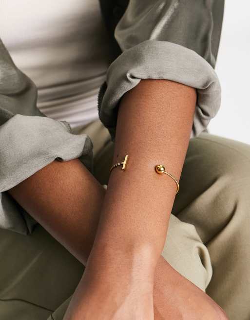 ASOS DESIGN 14k gold plate cuff bracelet with ball and bar design