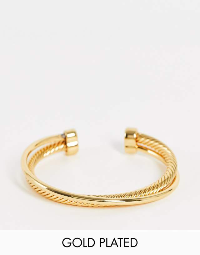 ASOS DESIGN 14k gold plated cuff bracelet in crossover twist design