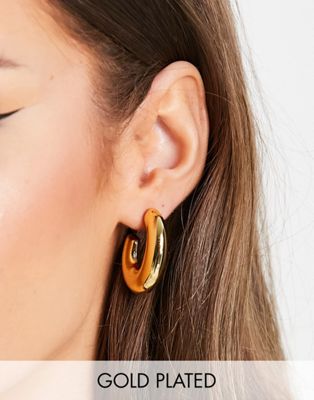 ASOS DESIGN 14k gold plated hoop earrings in chubby oval design | ASOS