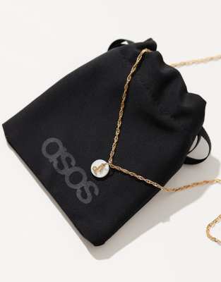 ASOS DESIGN 14k gold plated necklace with Capricorn zodiac and faux pearl disk design with gift bag