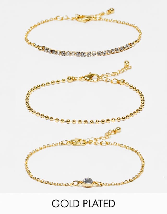 ASOS DESIGN 14K gold plated pack of 3 bracelets with fine crystal design