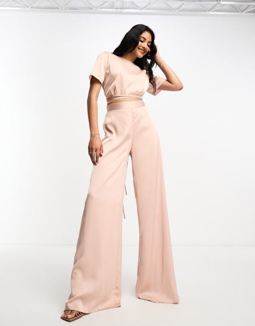 ASOS DESIGN 2 in 1 Jumpsuit aus rosa Satin mit Taillenschnurung ASOS