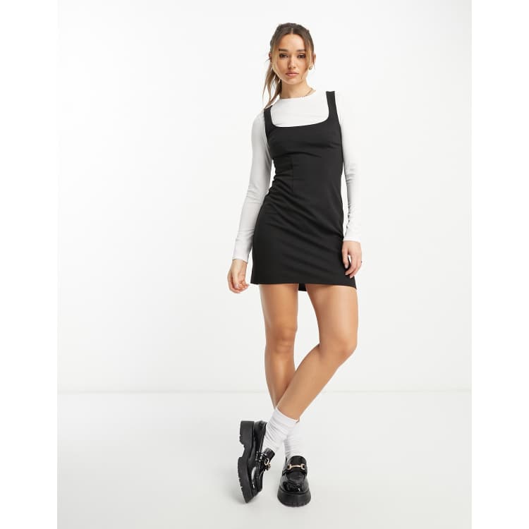 Buy Asos Design women petite peekaboo long sleeve flippy mini dress black  combo Online