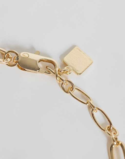 ASOS DESIGN 2-pack armband med zebramönster i guldfärg, 2 av 3