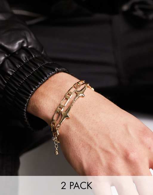 ASOS DESIGN 2 pack bracelets with figaro chain and crosses in gold tone