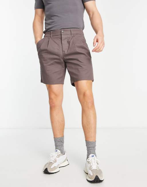 ASOS DESIGN pleated chino shorts in mid length in khaki