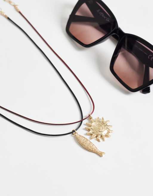 ASOS DESIGN 2-pack corded necklaces with sun and fish pendants in gold tone, 2 of 4