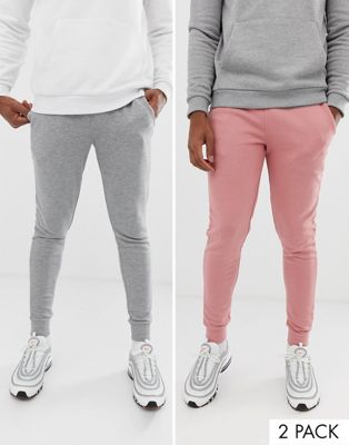 ASOS DESIGN – 2-pack med gråmelerade och rosa mjukisbyxor med extra smal passform-Flerfärgad