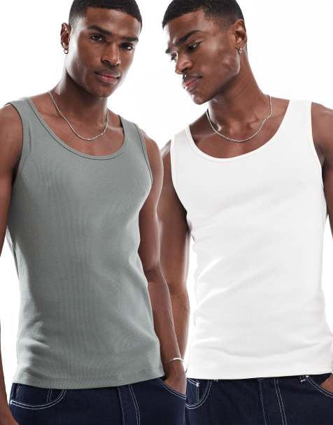 ASOS DESIGN 2-pack muscle fit ribbed tank tops in cream and khaki - view 1