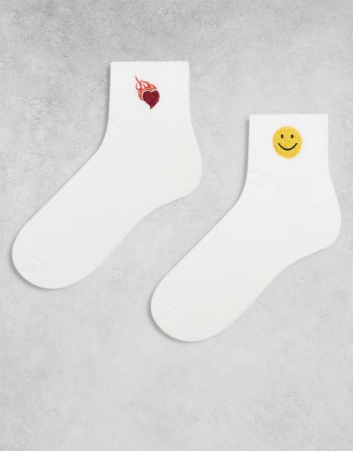 ASOS DESIGN 2 pack of socks with embroidery symbols in white