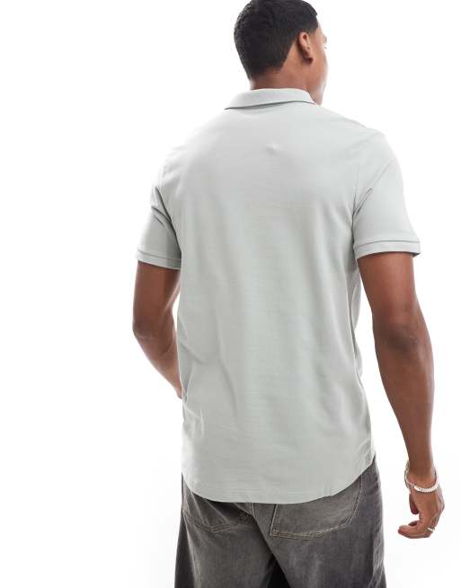 ASOS DESIGN 2 pack pique polo shirts in washed green and cream