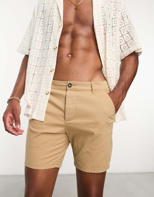 ASOS DESIGN pleated shorts in mid length in tan