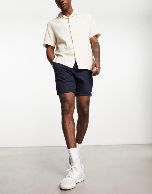 ASOS DESIGN slim chino shorts in navy