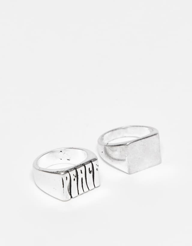 ASOS DESIGN 2-pack slim signet rings with 70s peace design in burnished silver