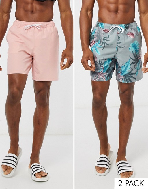 ASOS DESIGN 2 pack swim shorts in pink and floral print mid length save