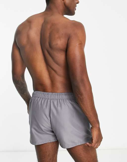 ASOS DESIGN swim shorts in short length with contrast waistband in