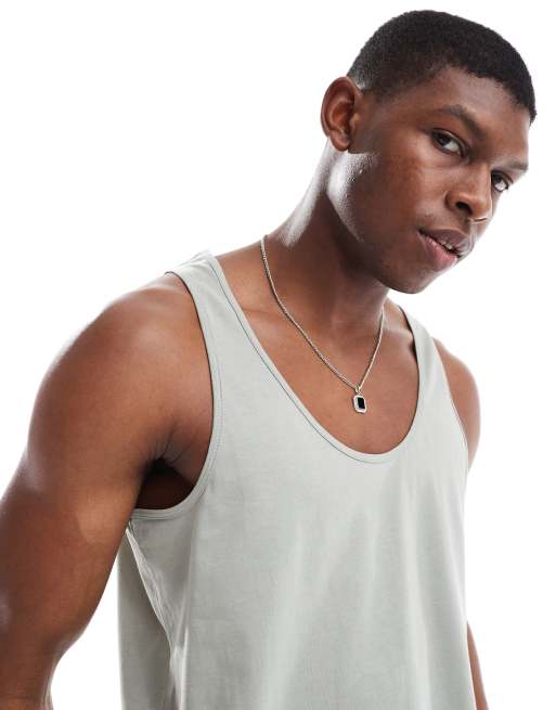 ASOS DESIGN 2 pack tank tops in washed green and brown