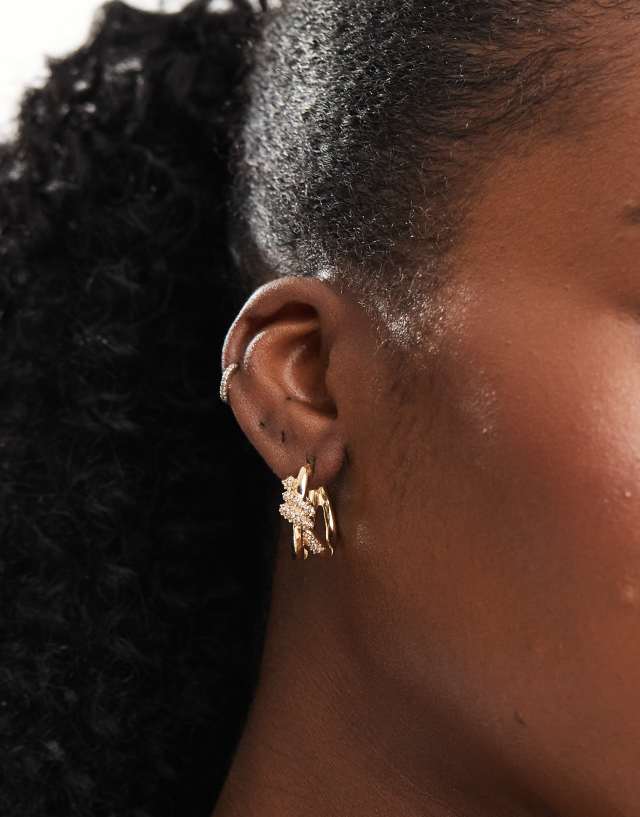 ASOS DESIGN - 20mm hoop earrings with crystal knot detail in gold tone