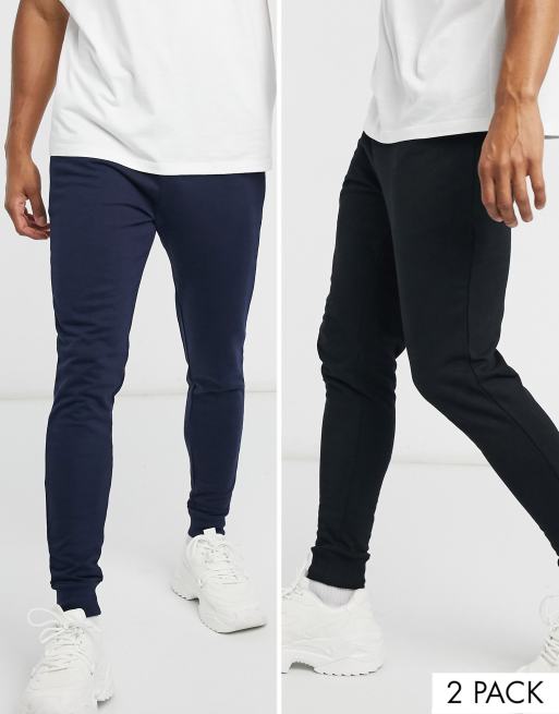 ASOS DESIGN – 2er-Pack eng geschnittene Jogginghosen in Schwarz/Marineblau - MULTI