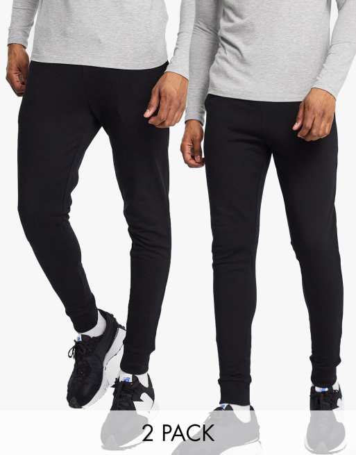 ASOS DESIGN – 2er-Pack enge Jogginghosen in Schwarz 