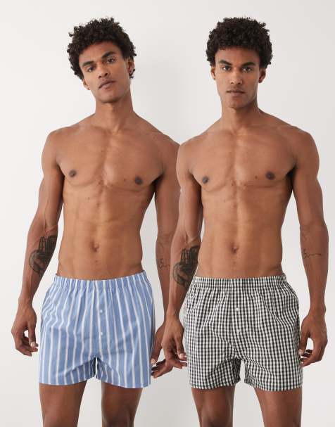 ASOS DESIGN – 2er-Pack gewebte Boxershorts in Blau gestreift und Schwarz kariert - view 1