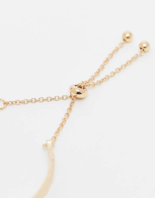 ASOS DESIGN – 2er-Pack goldfarbene Freundschaftsarmbänder mit Knebelverschluss-Detail, 3 von 3