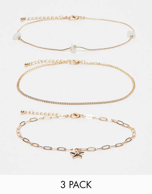 ASOS DESIGN – 2er-Pack goldfarbene Fußkettchen mit offenen Gliedern und Seesternanhänger