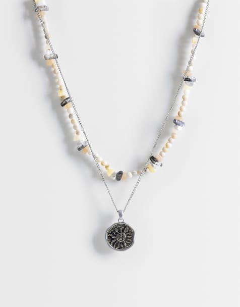ASOS DESIGN – 2er-Pack goldfarbene Halsketten mit perlenbesetzten Stein- und Sonnenanhängern - view 1