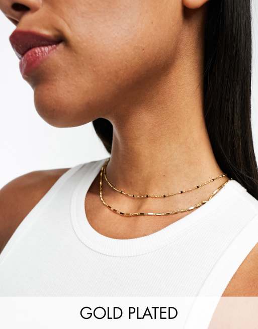 ASOS DESIGN – 2er-Pack Halsketten mit 14-Karat-Vergoldung, Punkt- und Stabdesign und schwarzen Emaille-Details