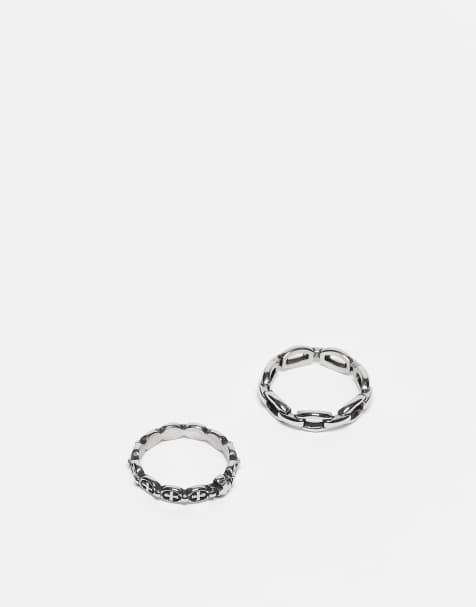 ASOS DESIGN – 2er-Pack Ringe in brünierter Silber-Optik aus wasserfestem Edelstahl mit Ketten- und Kreuz-Design - view 1