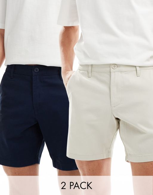 ASOS DESIGN – 2er-Pack schmal geschnittene Chinoshorts mit Stretch in Marineblau und Steinbeige