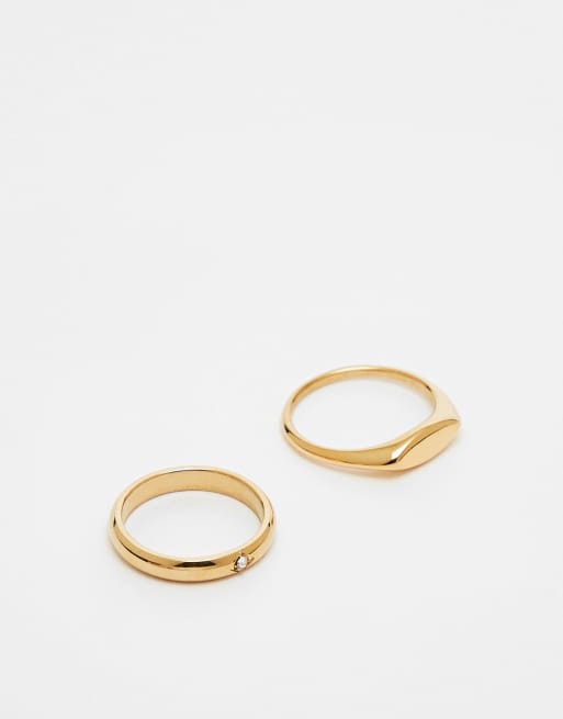 ASOS DESIGN – 2er-Pack Siegelringe aus wasserfestem, goldfarbenem Edelstahl mit Kristallbesatz