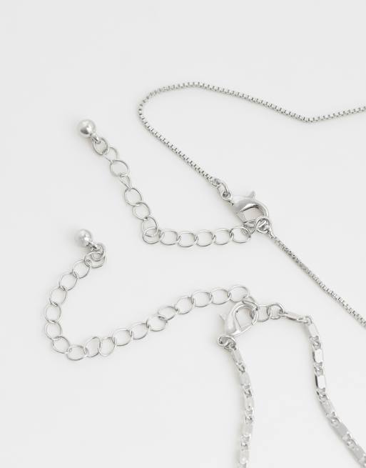 ASOS DESIGN – 2er-Pack silberfarbene Halsketten mit Knotenanhänger und strukturierter Kette, 3 von 4