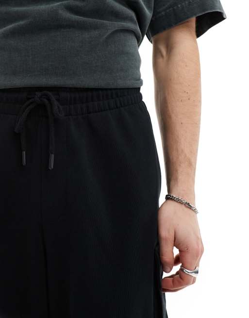 ASOS DESIGN - 3/4 parachuteshort met 4 zakken in zwart, 4 van 5