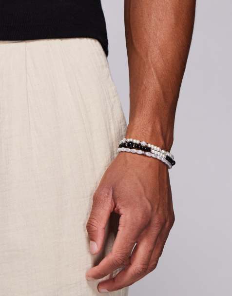 ASOS DESIGN 3 pack beaded bracelets with faux pearl in cream - view 1