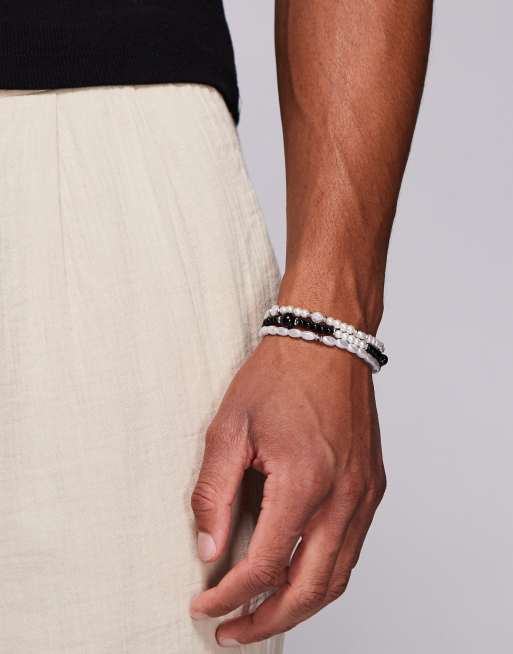 ASOS DESIGN 3 pack beaded bracelets with faux pearls in cream