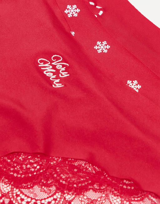 ASOS DESIGN 3 pack Christmas print no VPL & lace brazilian in cherry red, 2 of 3