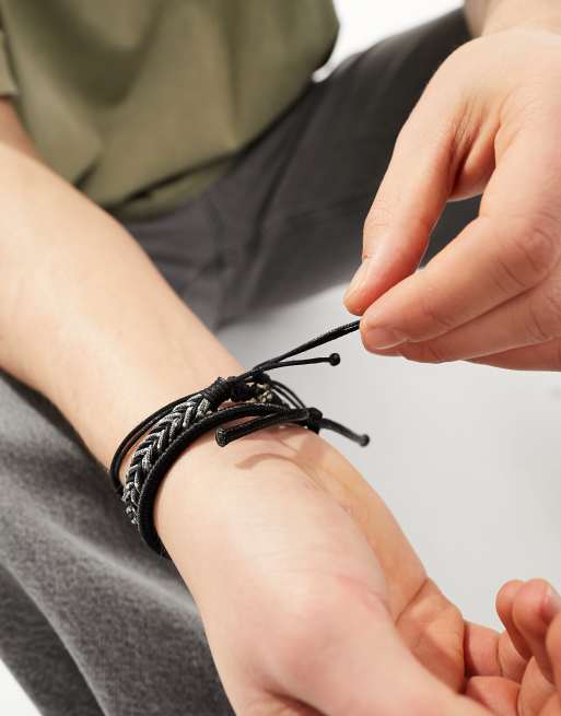 ASOS DESIGN 3 pack cord bracelet set with feather in black, 2 of 4