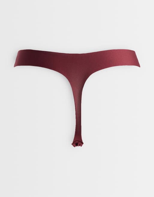 ASOS DESIGN 3 pack no vpl lingerie thong in black, white & burgundy, 2 of 3