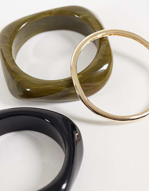 ASOS DESIGN 3 pack of bangles in black and khaki resin and gold tone, 2 of 3