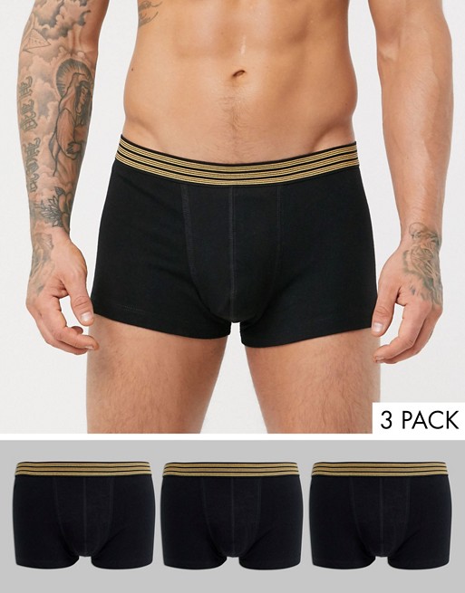ASOS DESIGN 3 pack short trunks in black organic cotton with contrast striped gold waistband