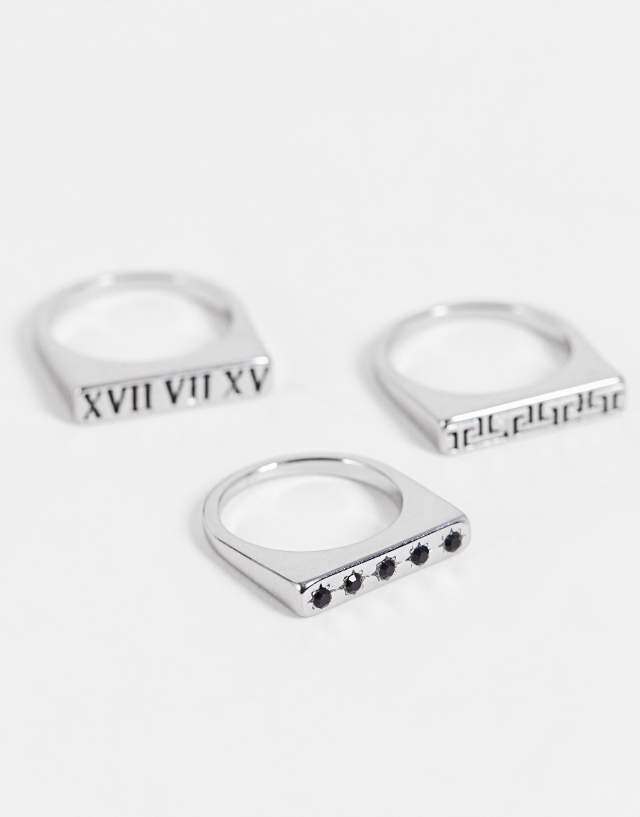 ASOS DESIGN 3 pack slim signet ring set with roman numerals and greek design in silver tone