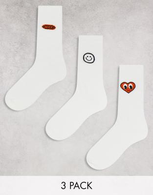 ASOS DESIGN 3 pack sports socks in off-white with embroidery detail