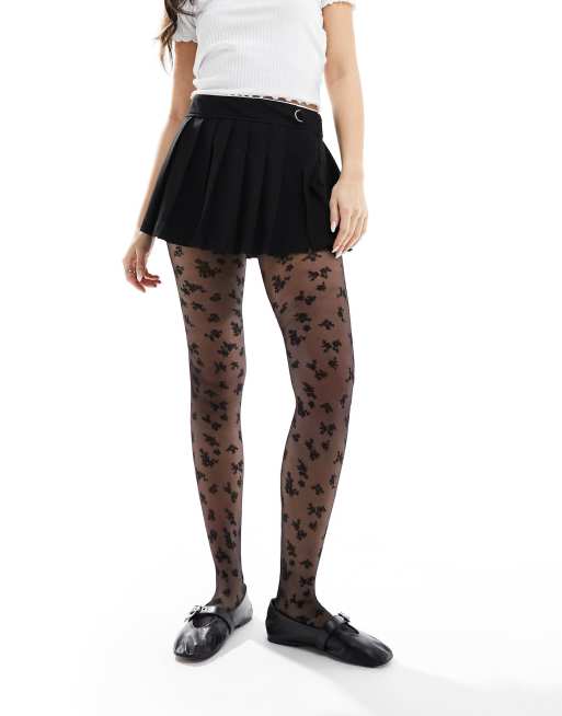 ASOS DESIGN lace tights with side cut out detail in black