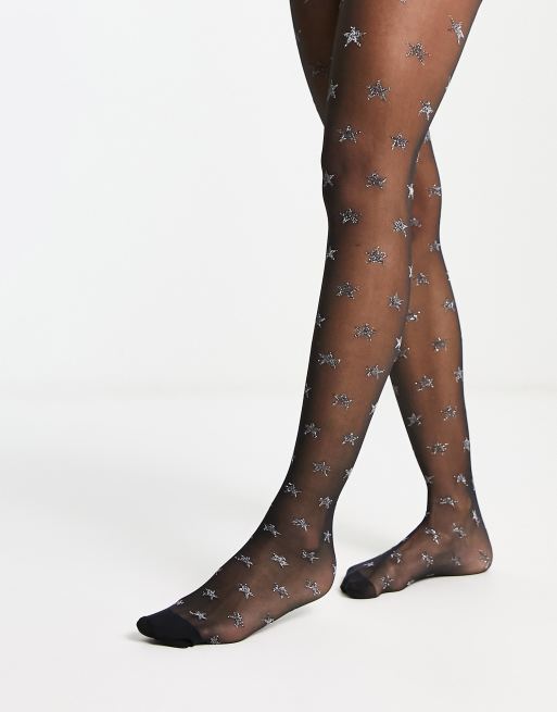 ASOS DESIGN 30 denier glitter star tights in black and silver