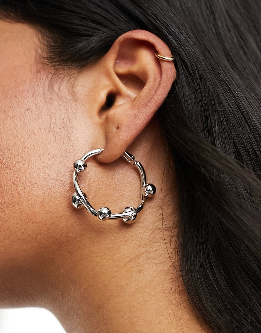 ASOS DESIGN 36mm hoop earrings with wiggle ball design in silver tone