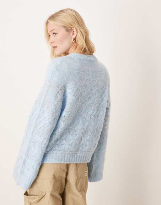 ASOS DESIGN 3D cable knit jumper with wide cuff in light blue