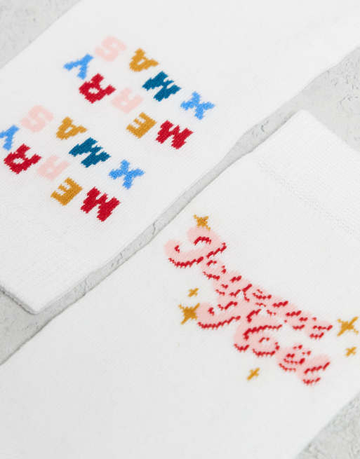 ASOS DESIGN – 3er-Pack bunte Socken mit weihnachtlichen „Feliz Navidad“-Motiven, 2 von 3