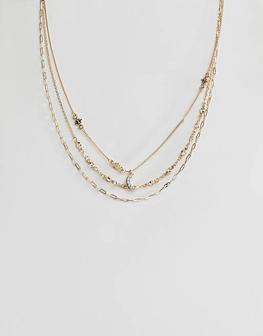 ASOS DESIGN – 3er-Pack goldene Halsketten mit Mond- und Stern-Design und Schmucksteinen